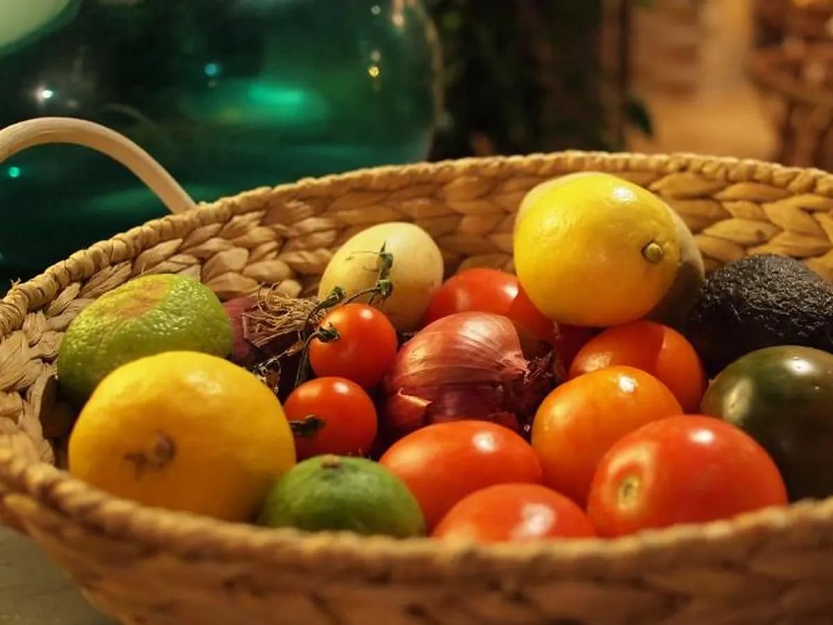 A basket of fresh vegetables and fruit